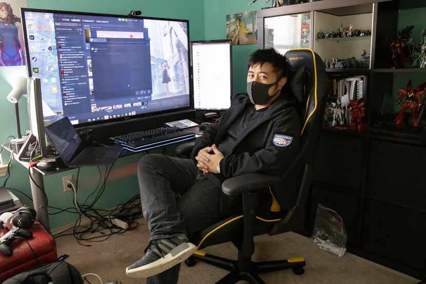 Warren Lee poses in his home office in Euless after returning from Wuhan on Thursday, Dec....