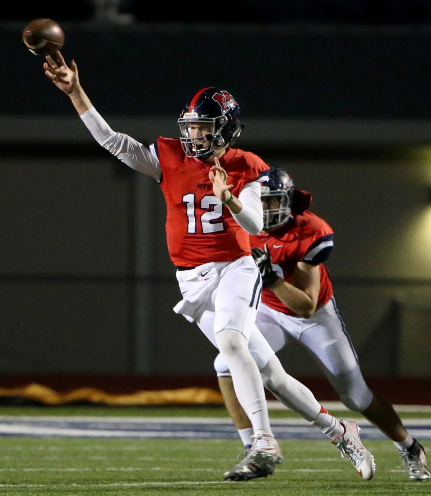 McKinney Boyd quarterback Grant Restmeyer (12) throws the ball in the first quarter during a...