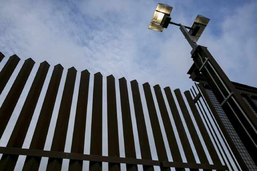 A section of border fence is shown in Hidalgo, Texas. A Mexican government official...