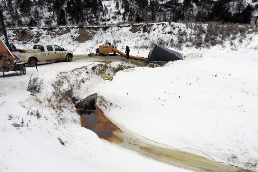 This Dec. 10, 2016 photo provided by the North Dakota Department of Health shows a cleanup...
