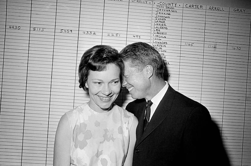 On Sept. 15, 1966, Jimmy Carter, then a Georgia state senator, hugs his wife, Rosalynn, at...