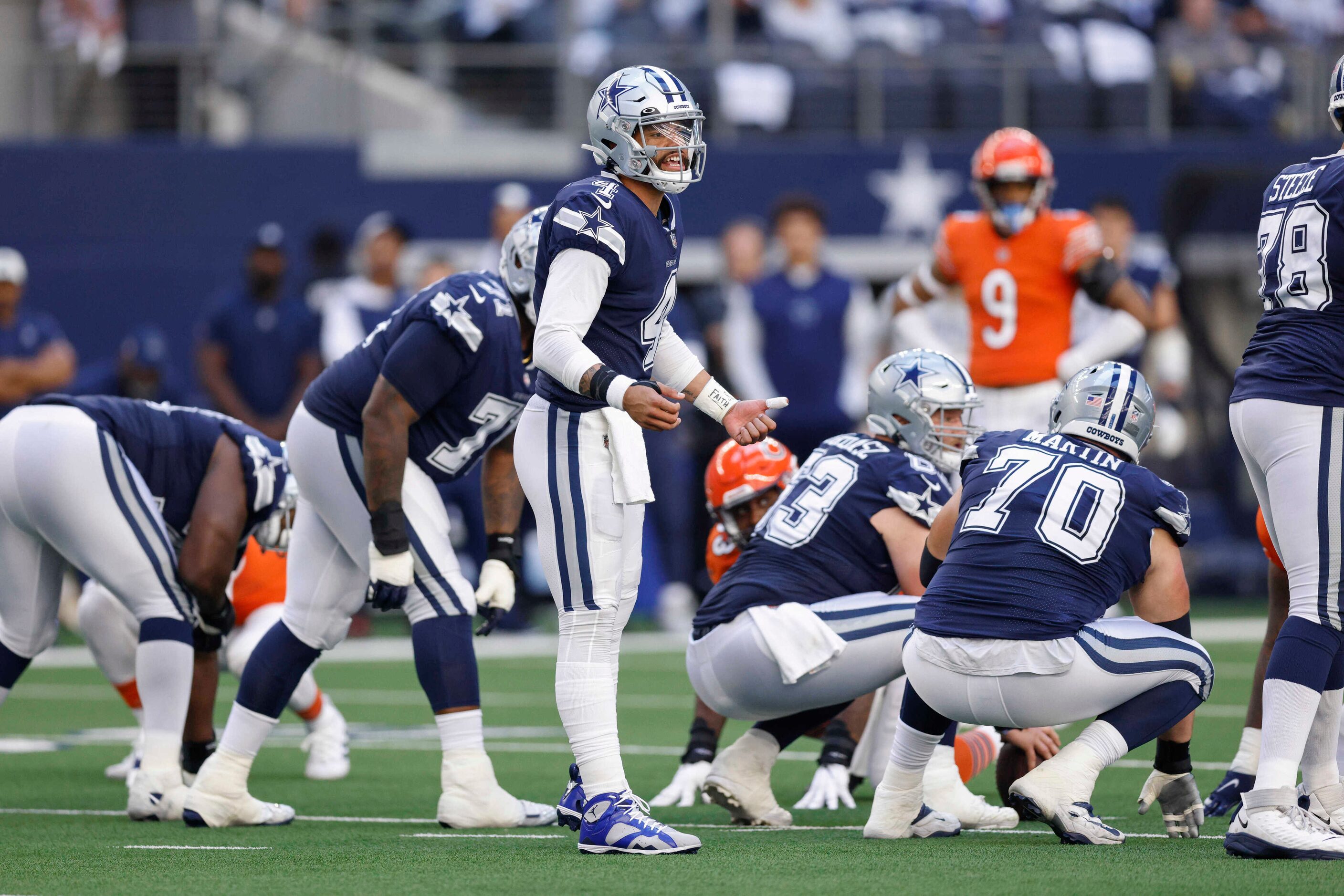 Dallas Cowboys quarterback Dak Prescott (4) wears a bandage on his left thumb after it was...