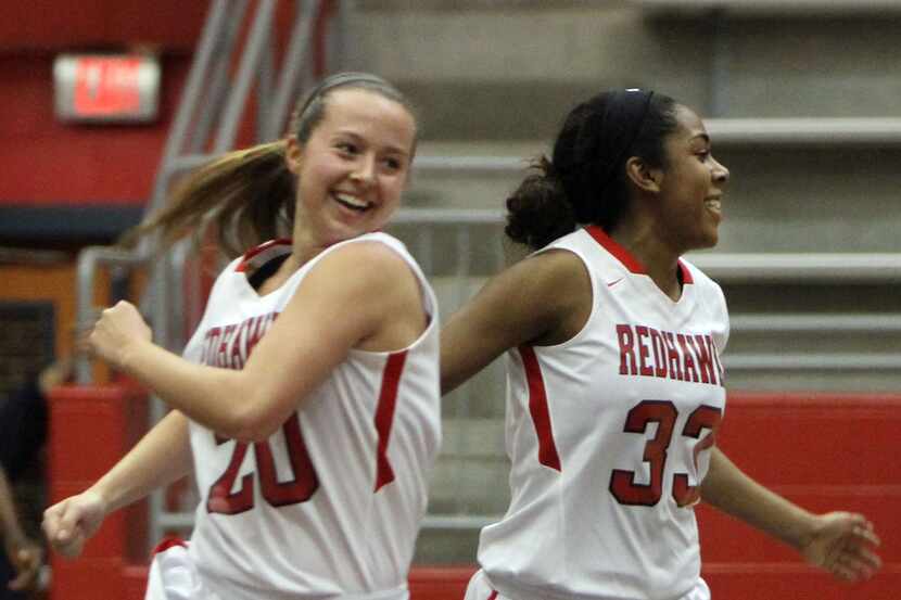 Frisco Liberty guards Majestie Robinson (33) and Gabrielle Casey (20) celebrate at mid court...