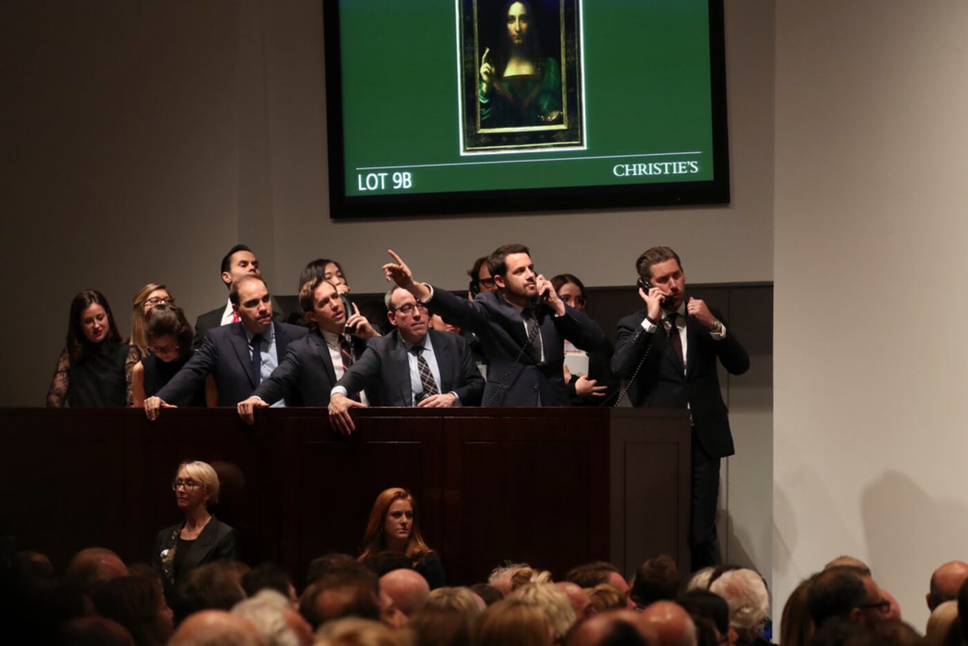 Bidding on the painting during the auction was intense. (Michelle V. Agins/The New York Times)