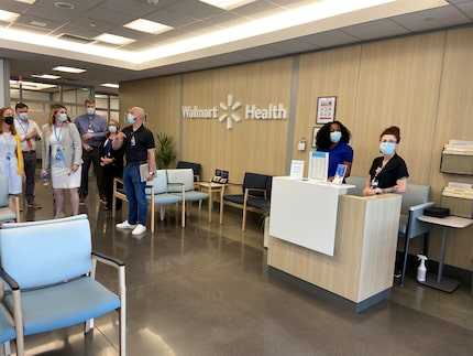 The entrance to the Walmart Health clinic at the Walmart Supercenter in Springdale, Ark....