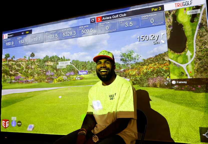 Dallas Cowboys running back Ezekiel Elliott laughed during a TruGolf launch event at the...