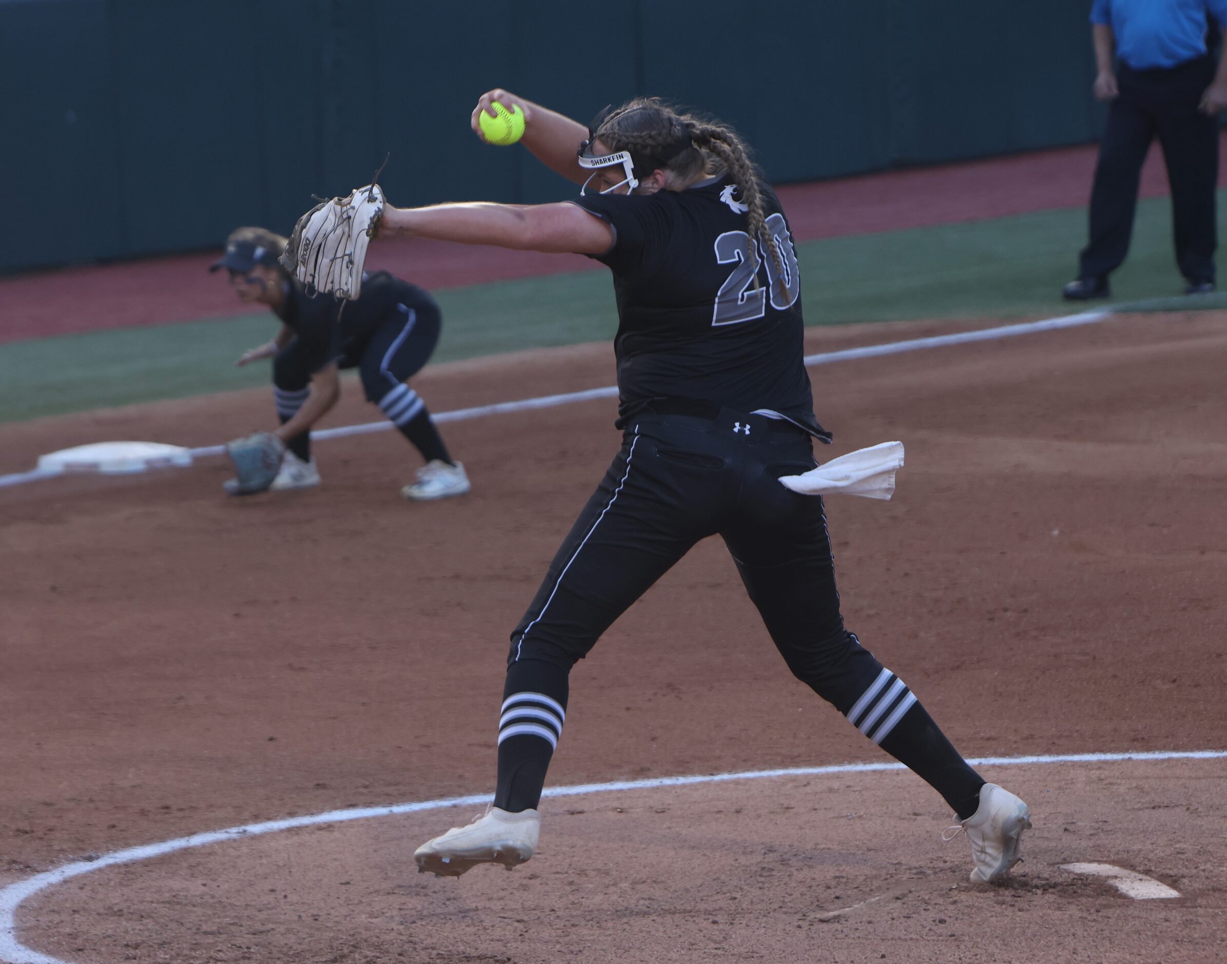 Denton Guyer pitcher Finley Montgomery (20) delivers a pitch to a Bridgeland batter during...