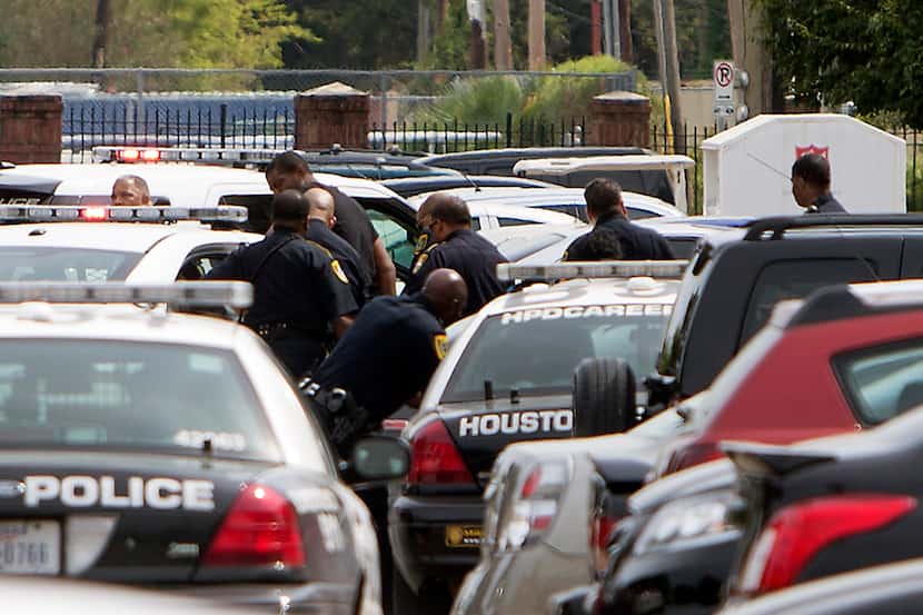 Authorities search for a man as they investigate a shooting at Texas Southern University,...