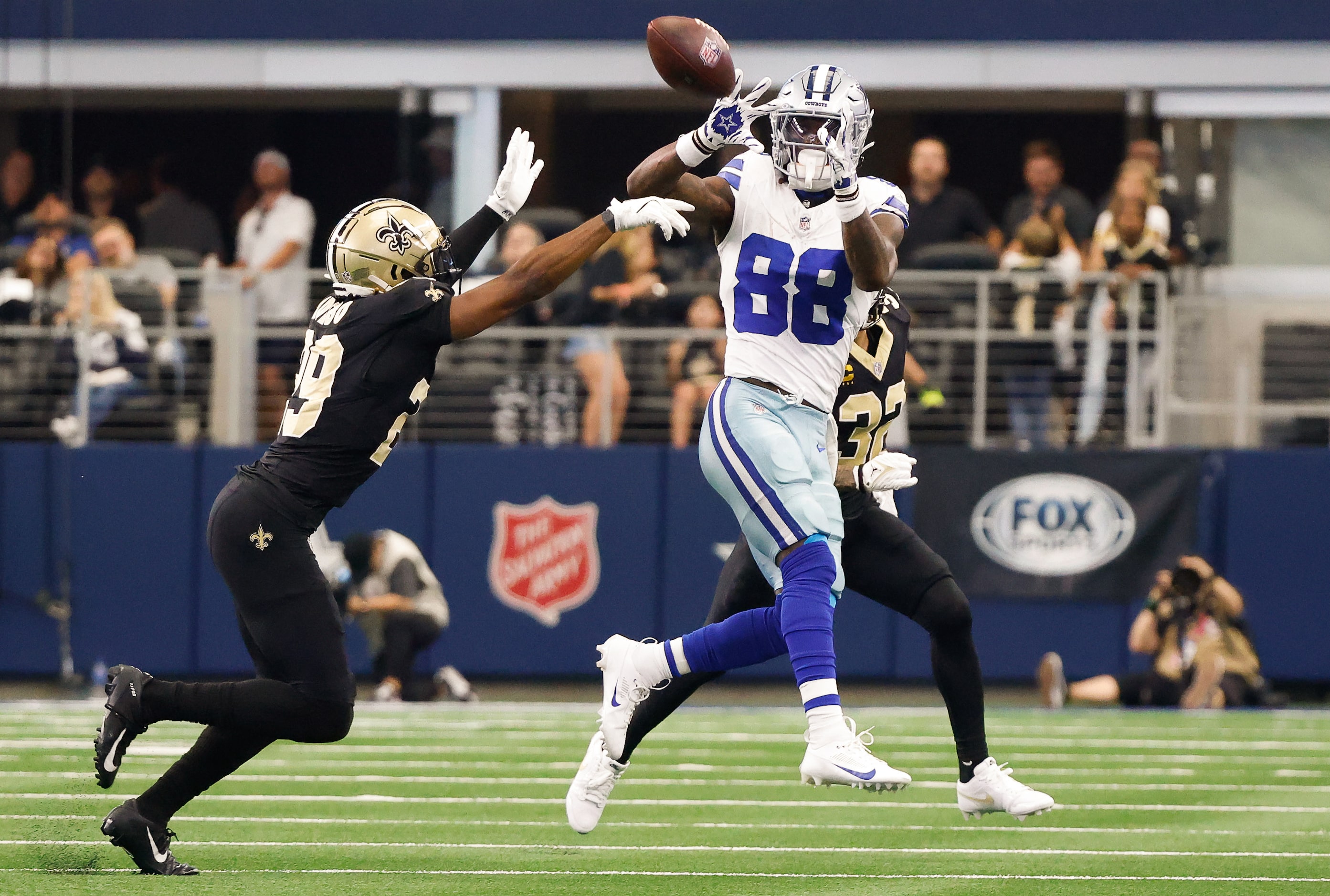 Dallas Cowboys wide receiver CeeDee Lamb (88) pulls in a second quarter touchdown pass in...