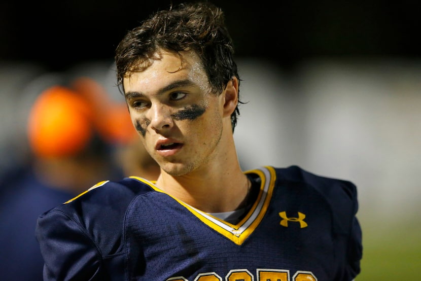 Highland Park quarterback John Stephen Jones (9) is pictured on the sideline during their...