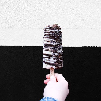 A popGelato with dark and white chocolate drizzle and extra Oreo crumble