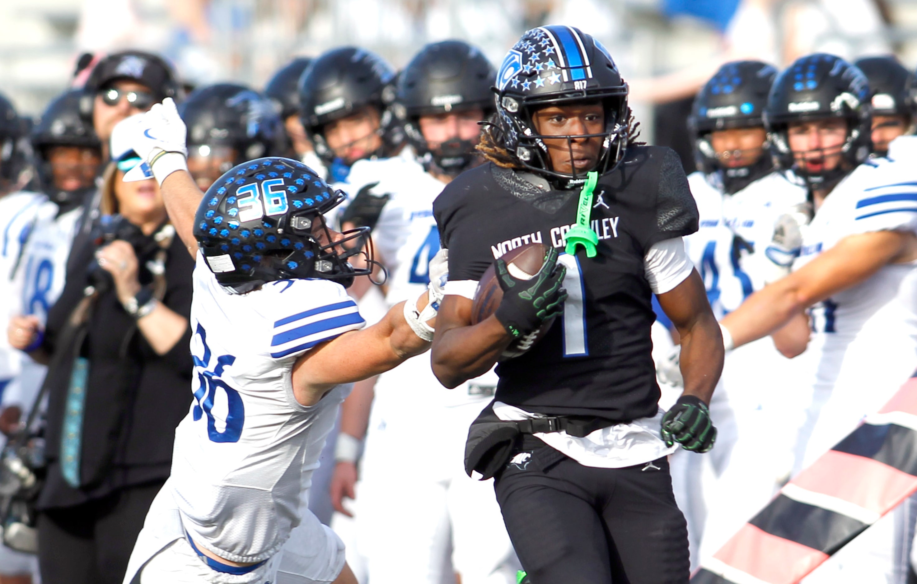 North Crowley running back Cornelius Warren (1), bolts down the sideline before Byron Nelson...