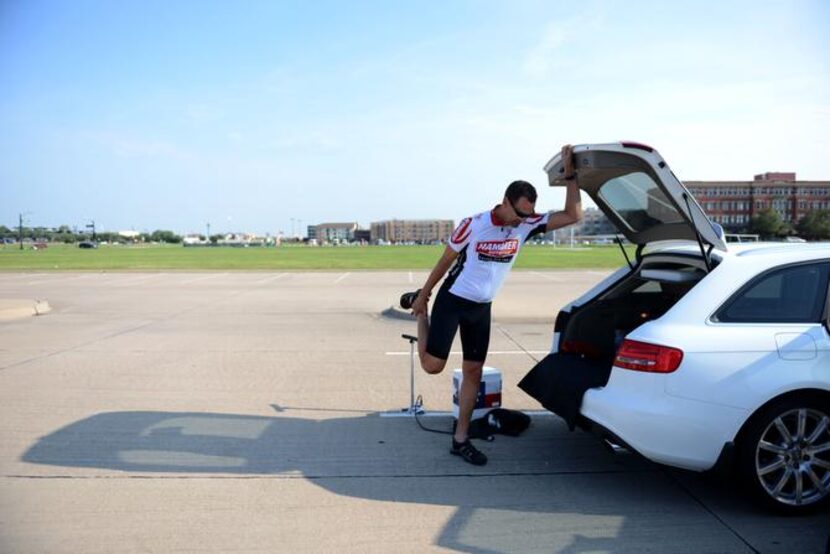 
Matt Maschmann, a member of the Shawnee Trail Cycling Club, stretches before a recent...