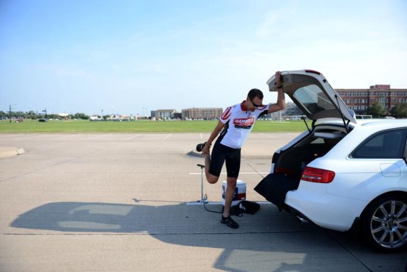 
Matt Maschmann, a member of the Shawnee Trail Cycling Club, stretches before a recent...