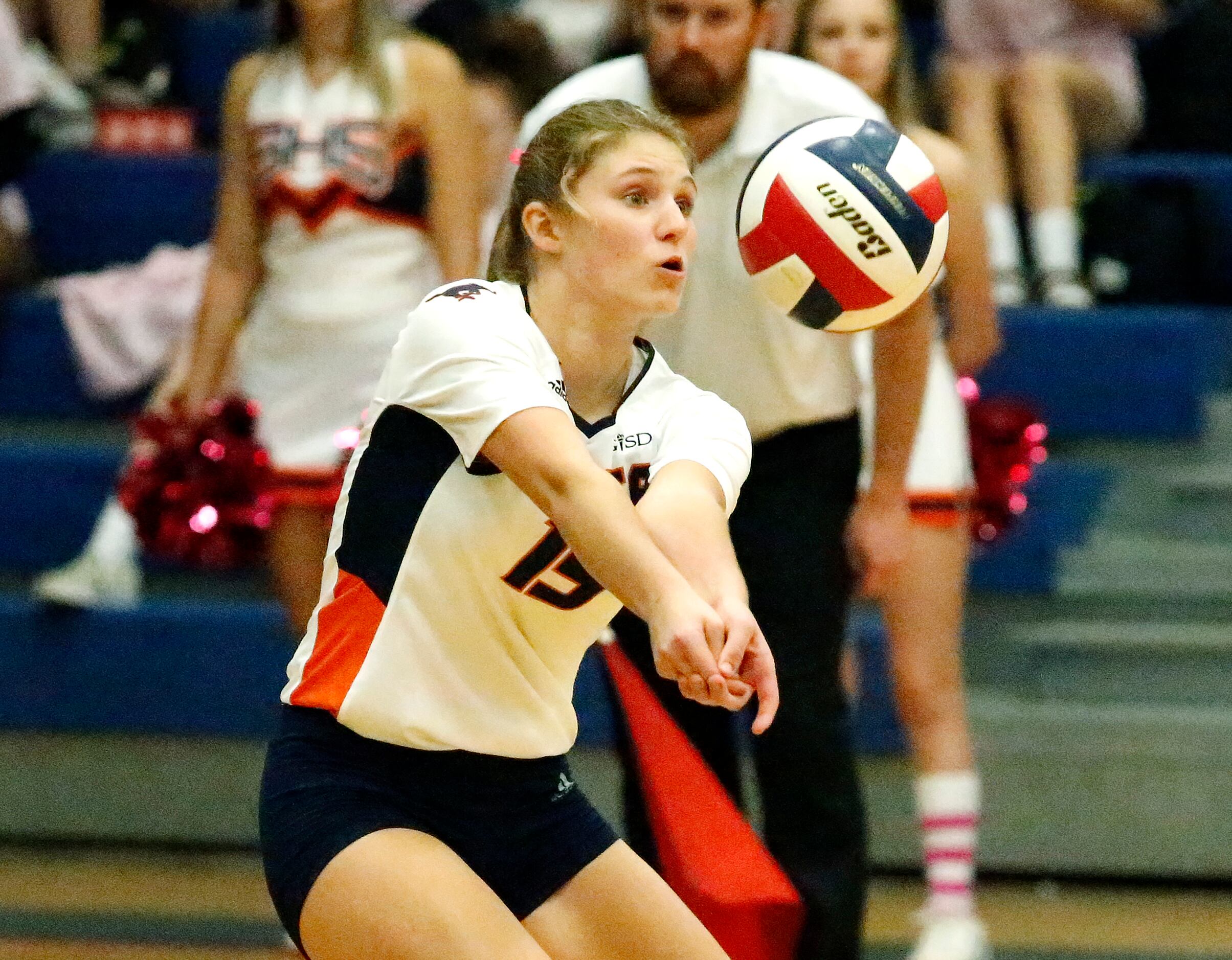 Sachse High School outside hitter Macy Taylor (15) fields a serve during game two as Sachse...