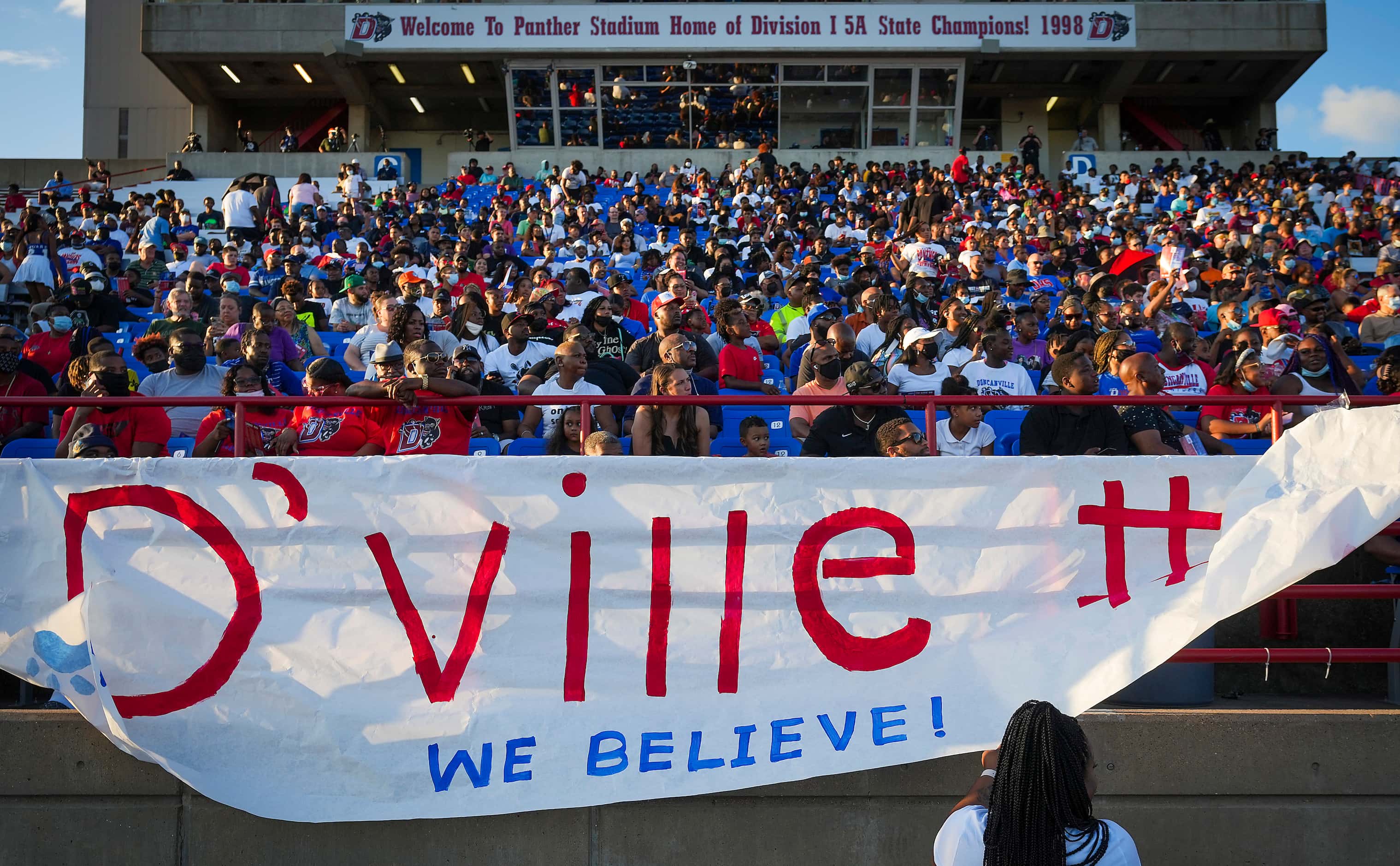 Duncanville students hand a banner before a high school football game against Mater Dei on...