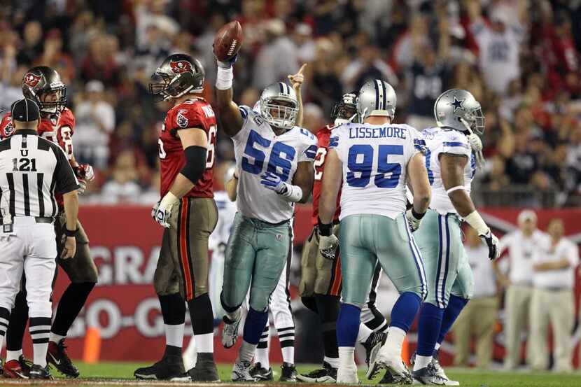 Dallas Cowboys inside linebacker Bradie James (56) recovers a fumble during the Dallas...