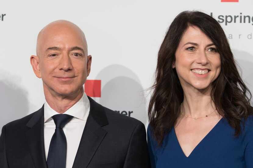 (FILES) In this file photo taken on April 24, 2018 Amazon CEO Jeff Bezos and his wife...