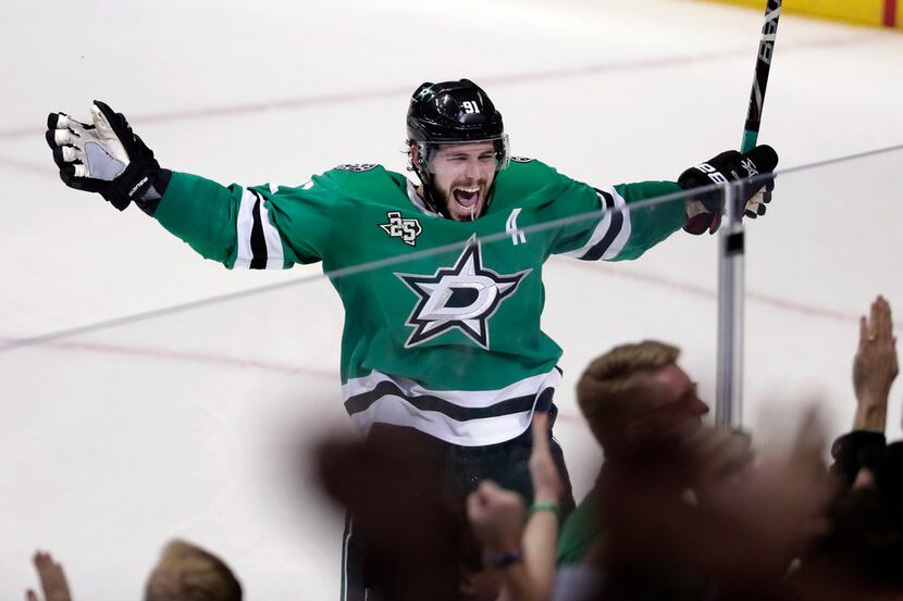 Dallas Stars' Tyler Seguin (91) celebrates their 3-2 overtime win during an NHL hockey game...