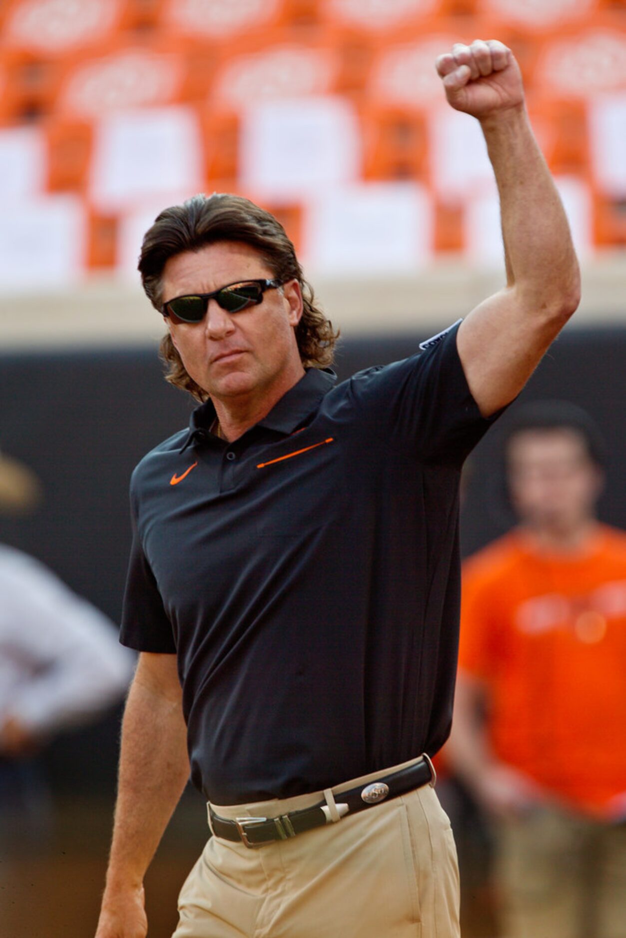 STILLWATER, OK - SEPTEMBER 28:  Head coach Mike Gundy of the Oklahoma State Cowboys walks on...