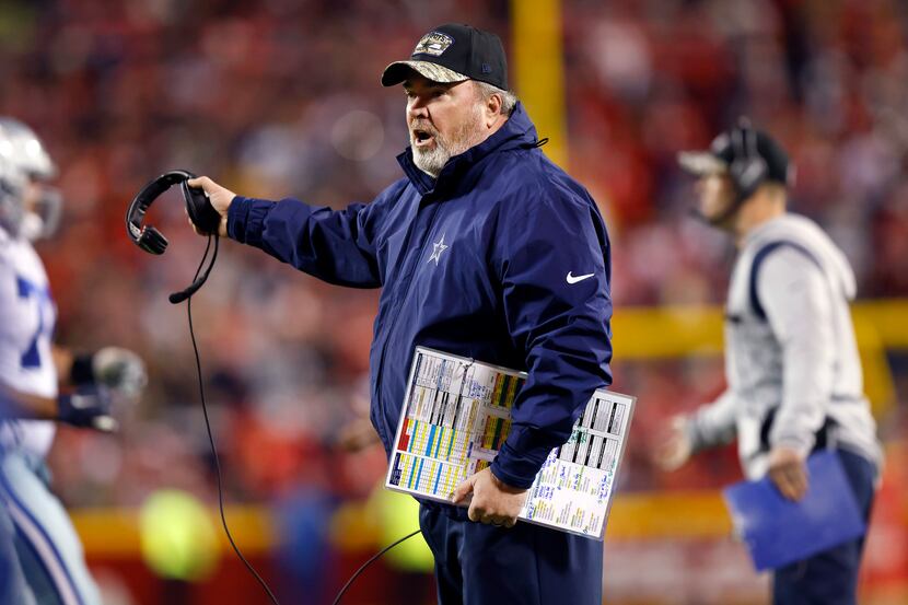 Dallas Cowboys head coach Mike McCarthy questions a call during the second half against the...