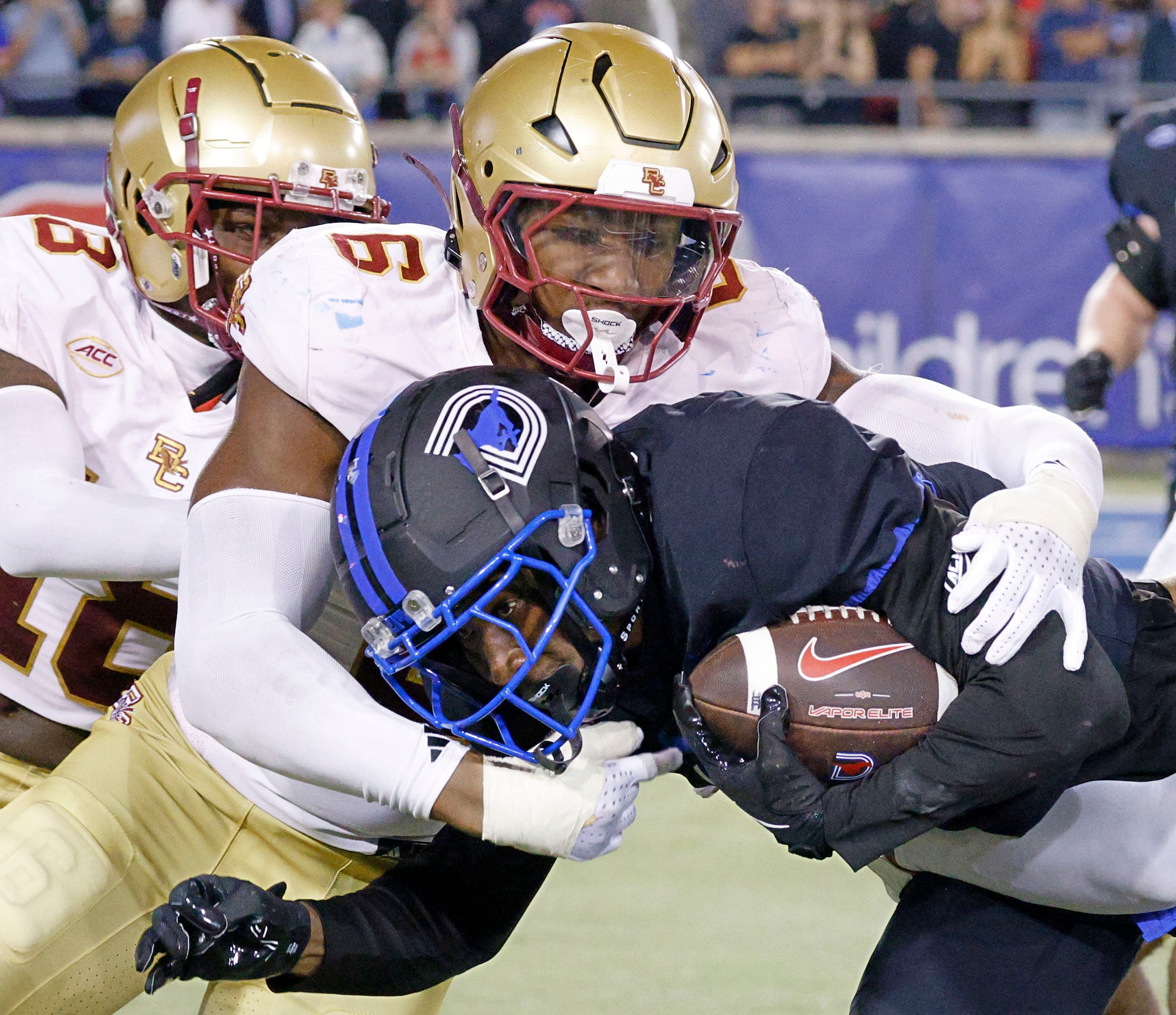 SMU wide receiver Jordan Hudson (8) is tackled by Boston College defensive end Donovan...