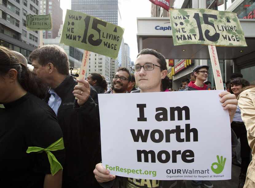 In 2014, demonstrators marched toward the Park Avenue home of Alice Walton, a Walmart heir,...