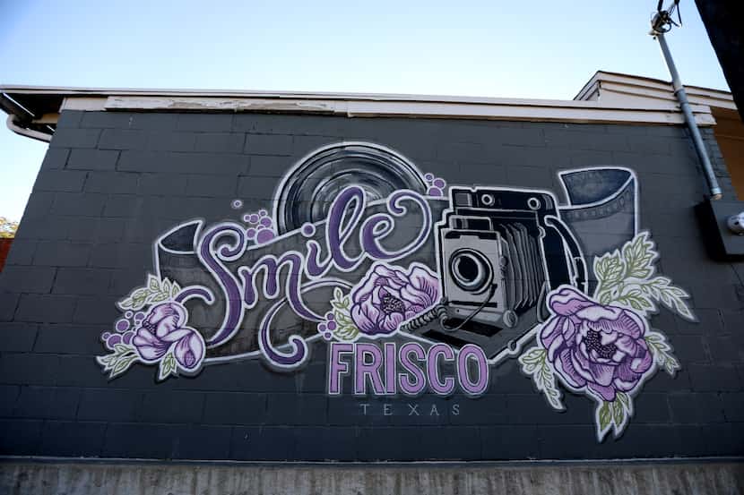 This mural by Misty Oliver Foster highlights photography on Main Street in downtown Frisco.