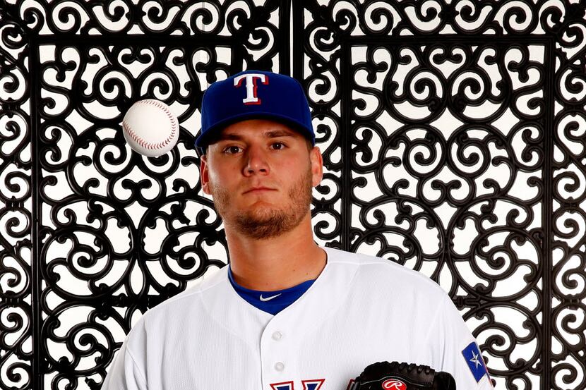 SURPRISE, AZ - FEBRUARY 28:  Pitcher Connor Sadzeck #59 of the Texas Rangers poses during a...