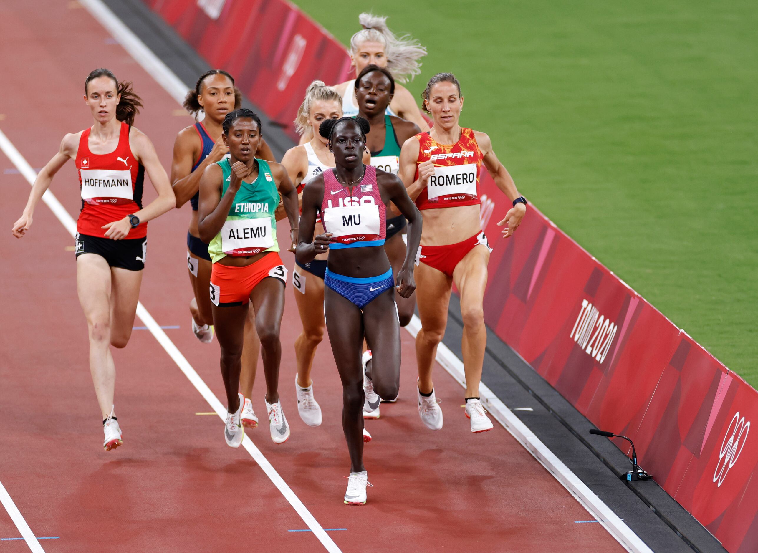 USA’s Athing Mu leads the way as she competes in the women’s 800 meter semifinal race during...