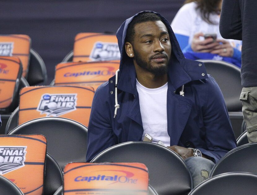 Former Kentucky player, now with the Washington Wizards, John Wall waits for the start as...