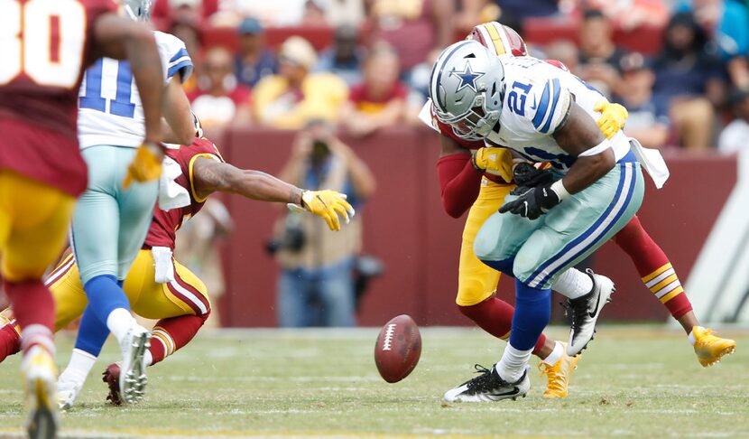 Washington Redskins cornerback Josh Norman (24) forces Dallas Cowboys running back Ezekiel...