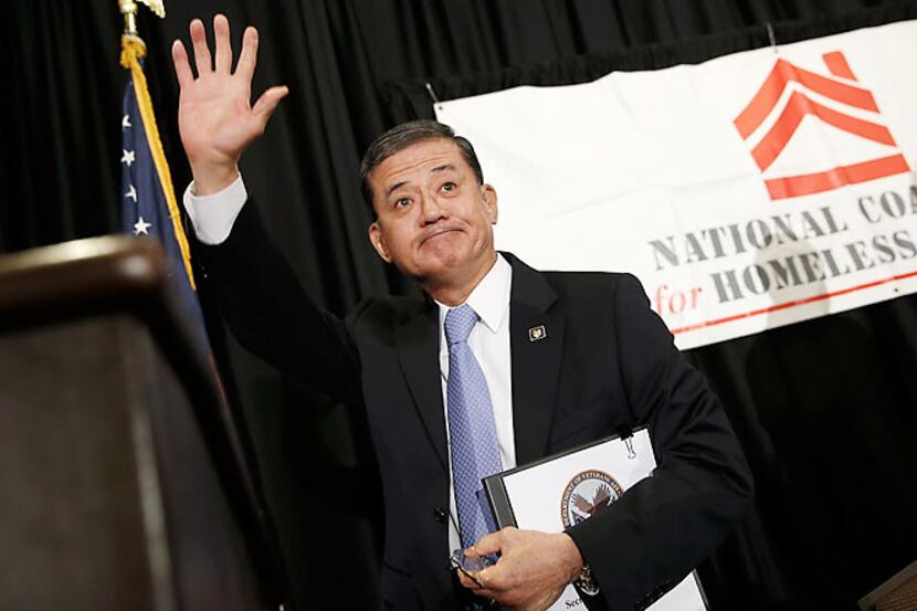 Veterans Affairs Secretary Eric Shinseki waves after addressing the National Coalition for...