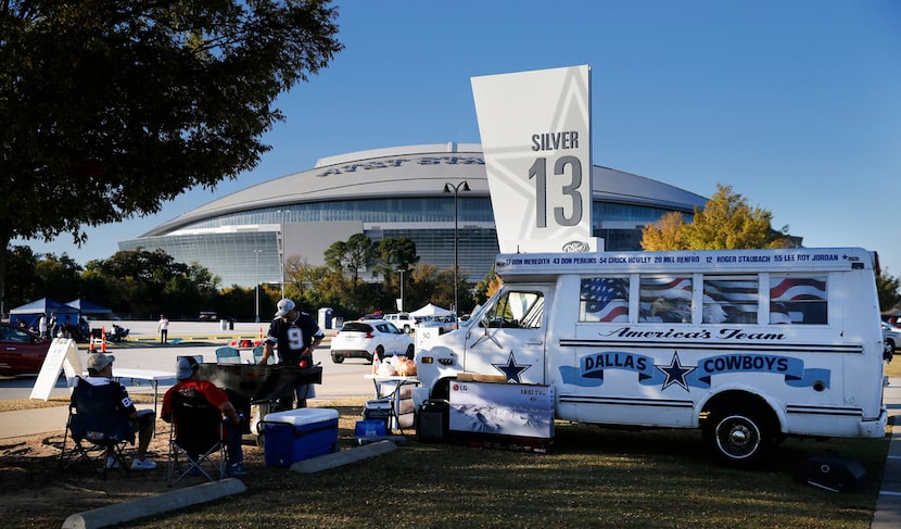 Dallas Cowboys fan Albert Sorola of Grand Prairie parked his 1970's bus named Camp Romo...