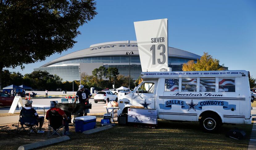 Dallas Cowboys fan Albert Sorola of Grand Prairie parked his 1970's bus named Camp Romo...