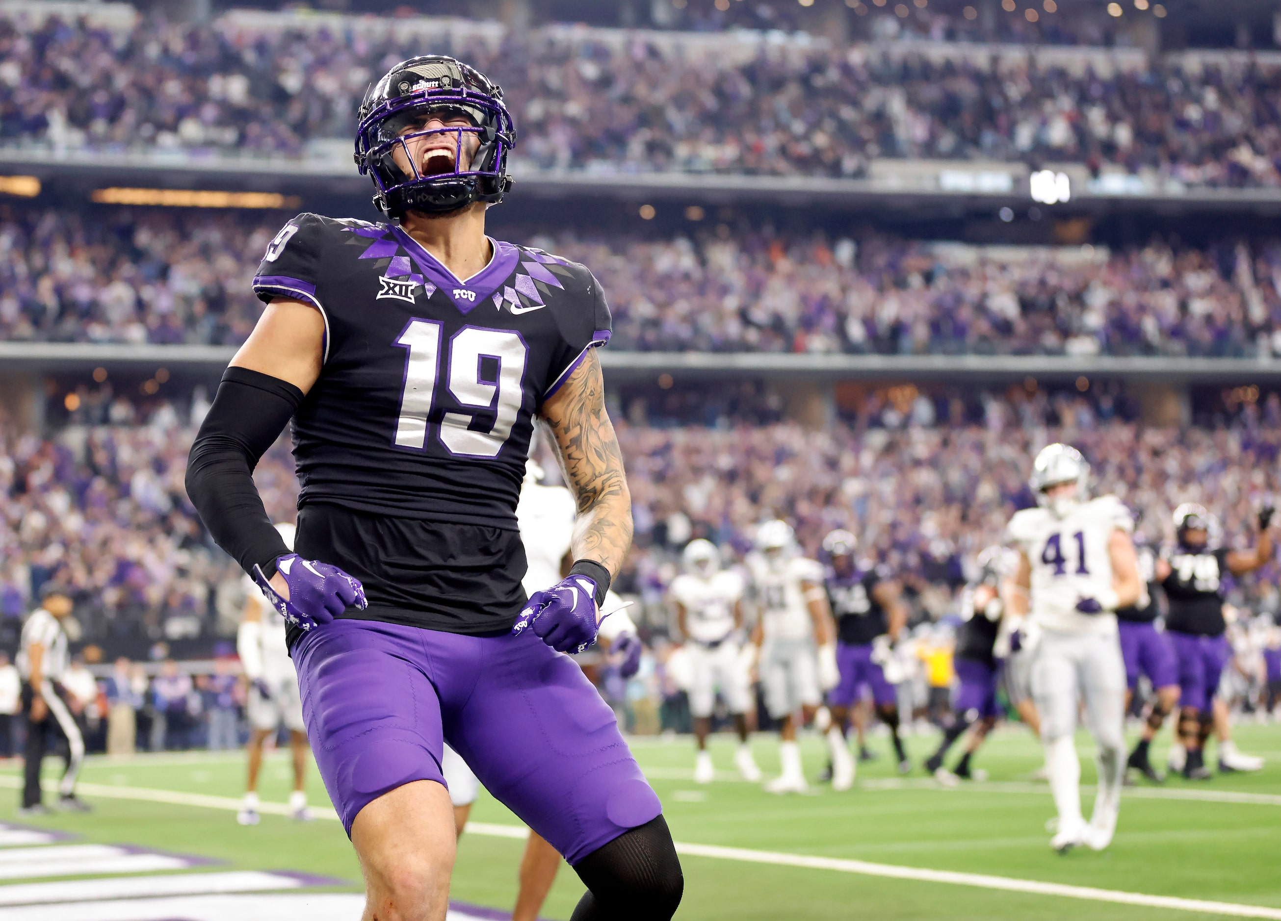 TCU Horned Frogs tight end Jared Wiley (19) celebrates his two-point conversion to tie the...