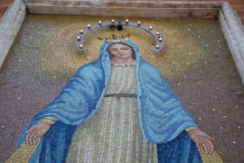 You need not even enter a church in Rome to discover beautiful religious art. This mosaic of...