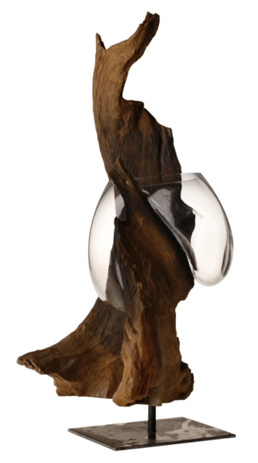 Sculpted by nature: Driftwood is transformed into art with the hand-blown Droplet vase. The...