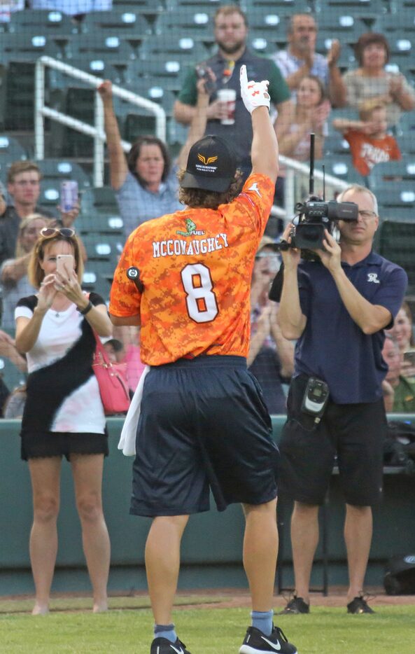 Actor Matthew McConaughey acknowledges the cheers of the crowd after the Red River celebrity...