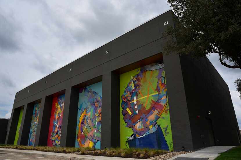 Murals by Spanish artist Adrian Torres decorate the fitness center on the campus of Legacy...
