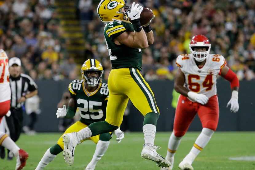 Green Bay Packers' Ty Summers intercepts a pass and returns it 74 yards for a touchdown...