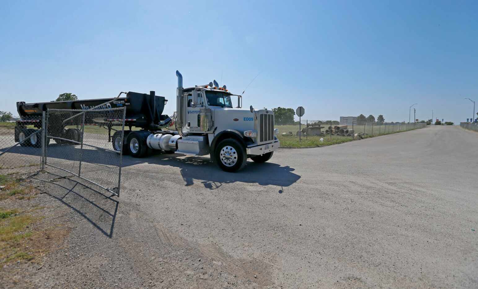 A truck leaves the Bayside project area near Lake Ray Hubbard in Rowlett on Thursday (Jae S....