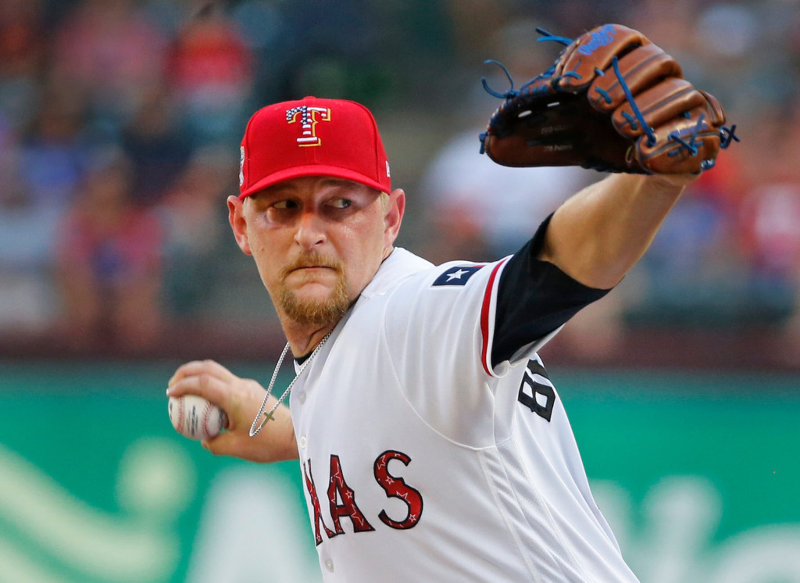 Texas Rangers starting pitcher Austin Bibens-Dirkx (56) throws a first inning pitch during...