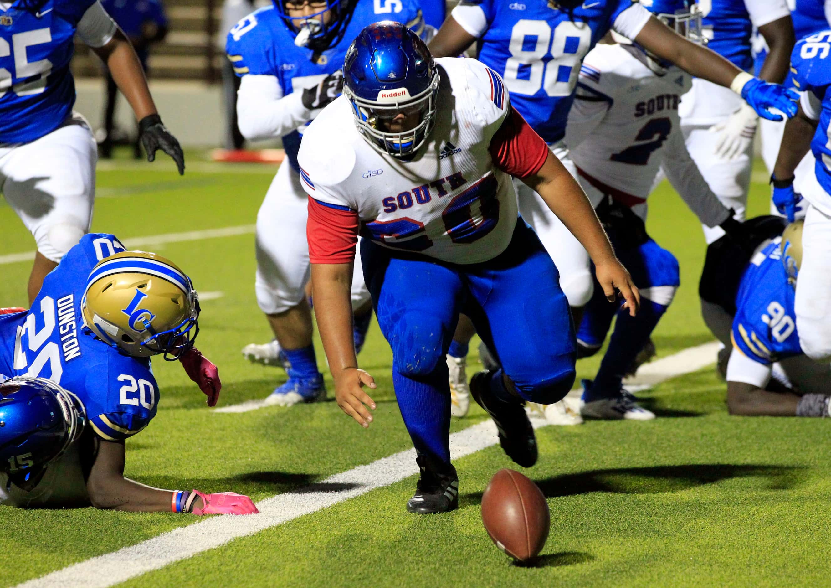 South Garland’s Ismael Alvarez (60) chases down a fumble in the end zone to stop a Lakeview...