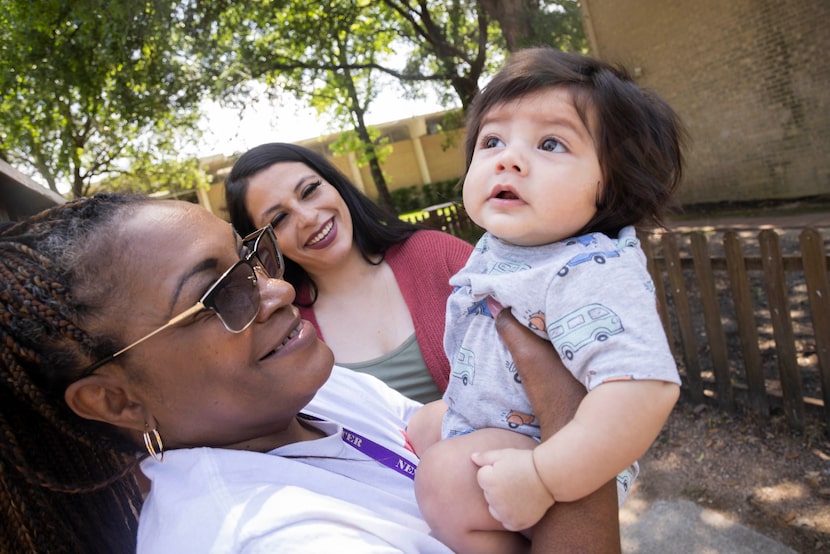 Milly Jackson (left), one of the Nexus recovery advocates, plays with Anthony, the...