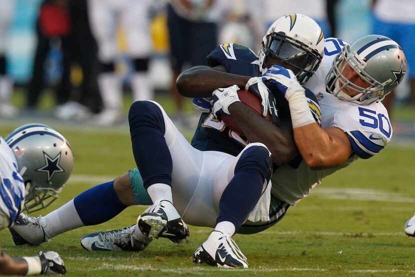 Cowboys linebacker Sean Lee tackles San Diego Chargers running back Ronnie Brown.