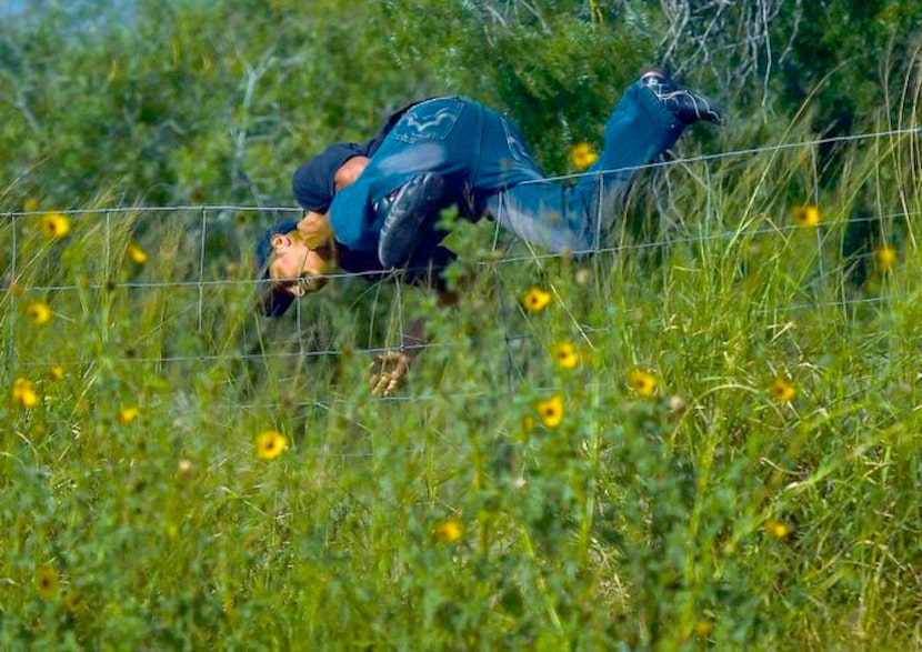 
An immigrant jumped a fence while running from Brooks County sheriff’s Deputy Elias Pompa...