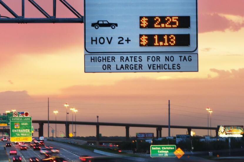
Drivers on LBJ Freeway can opt for tolled lanes to avoid traffic crunches. Car poolers get...