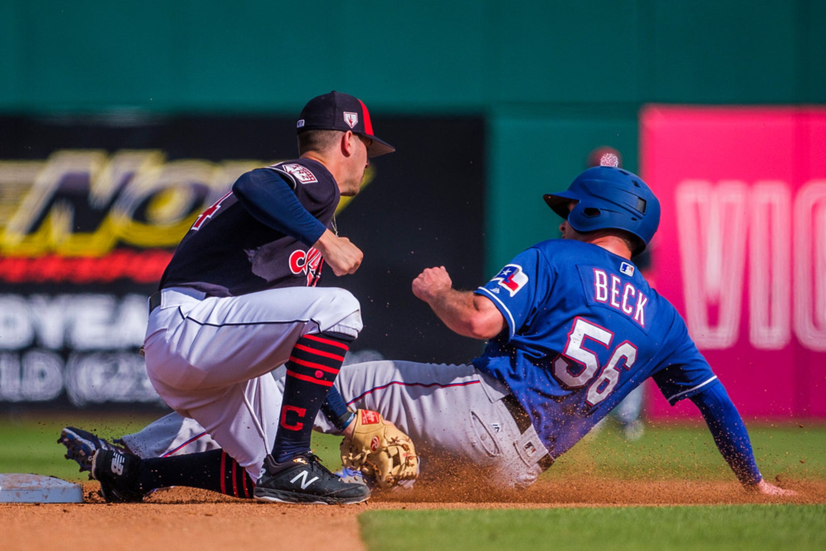 Texas Rangers first baseman Preston Beck is caught stealing as Cleveland Indians second...