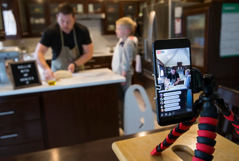 Chef Joe Baker of Joe the Baker and his son, Blais Baker, 5, who is dressed as a shark, host...